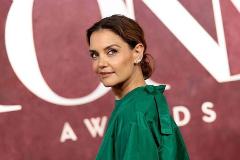Katie holmes showcases watermelon colors in a pink and green