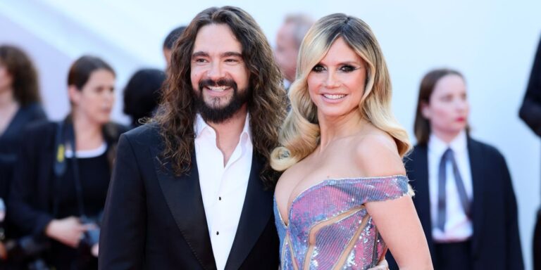 Heidi klum displays affection with husband in bikini video