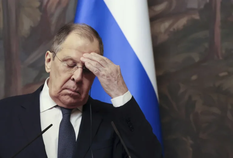 Russian foreign minister wears a soviet sports jersey upon landing