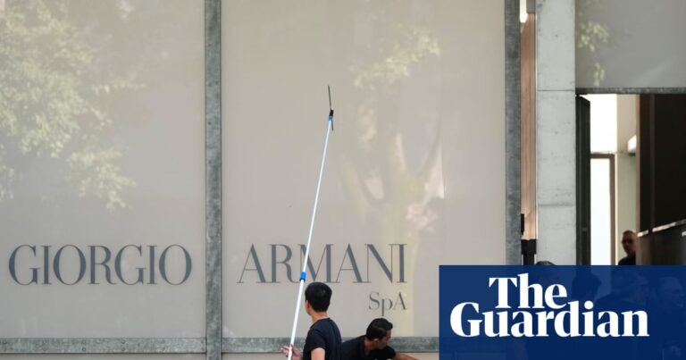 Crowds assemble outside giorgio armani's milan headquarters to honor him