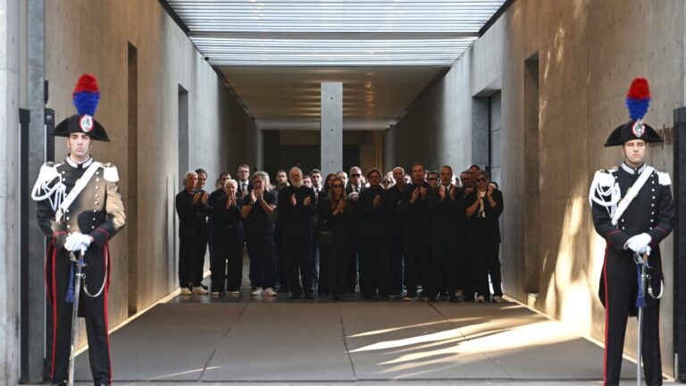 Mourners pay their respects to fashion legend giorgio armani in