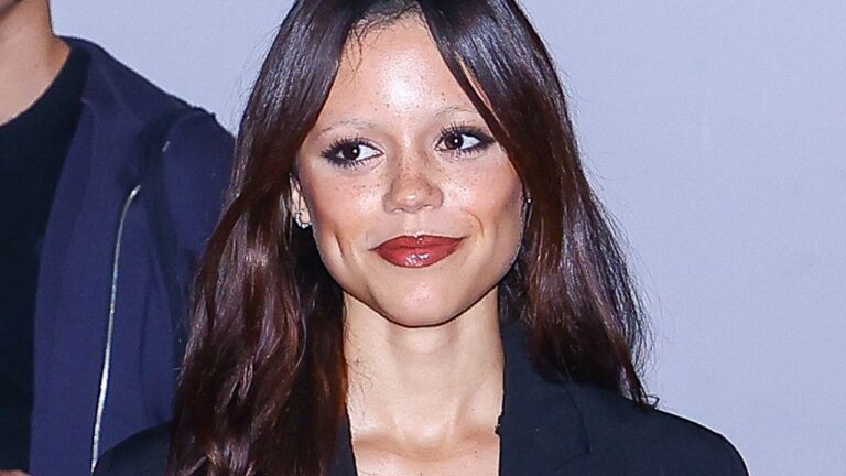 Jenna Ortega pairs her finest silk dress with worn out combat