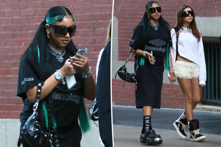 North West dons a $5,000 Balenciaga ensemble paired with designer Crocs in New York City. North West dons a $5,000 Balenciaga ensemble paired with designer