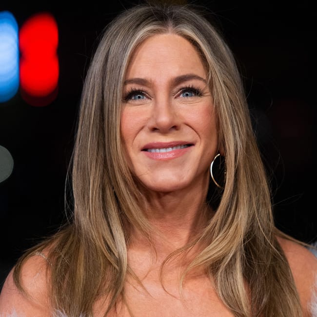 Jennifer Aniston Stuns in a Stylish Winter Coat During Recent Outing with Jim Curtis Jennifer Aniston Stuns in a Stylish Winter Coat During Recent