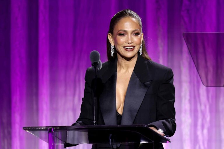 Jennifer Lopez Adds a Provocative Edge to the Classic Blazer with a Low-Cut Slip Dress Jennifer Lopez Adds a Provocative Edge to the Classic Blazer